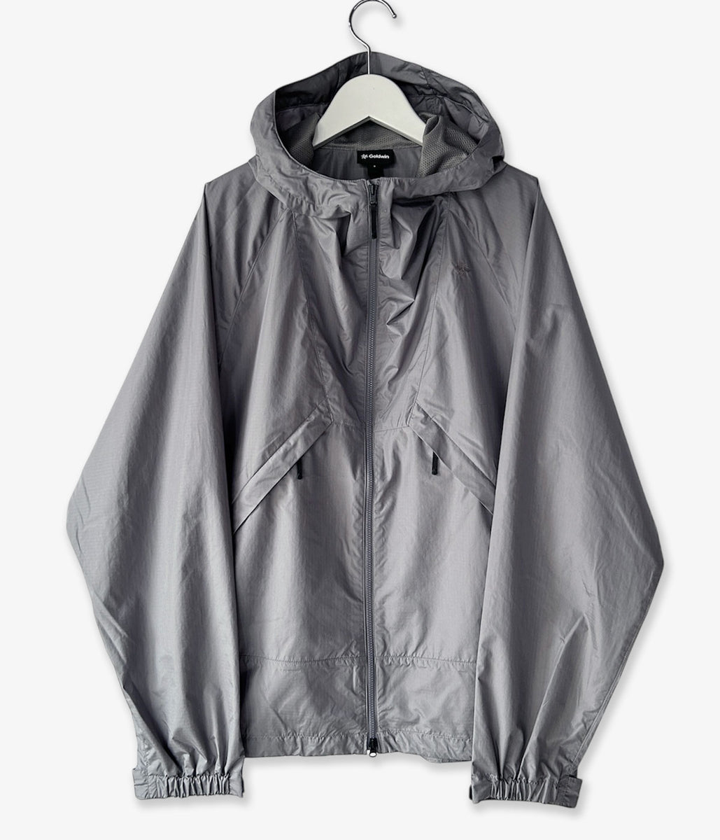 ジャケット・アウター  Dyed Rip-stop Hooded Jacket Goldwin/RIP-STOP HOODED JACKET (METALLIC GRAY)