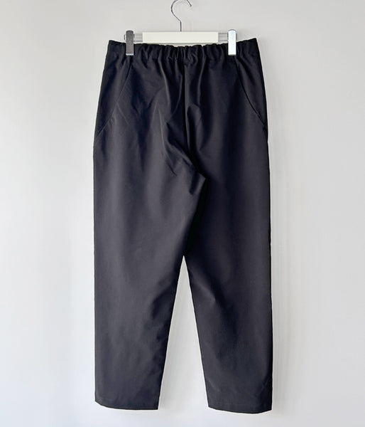 Goldwin/ONE TUCK TAPERED STRETCH PANTS (BLACK)