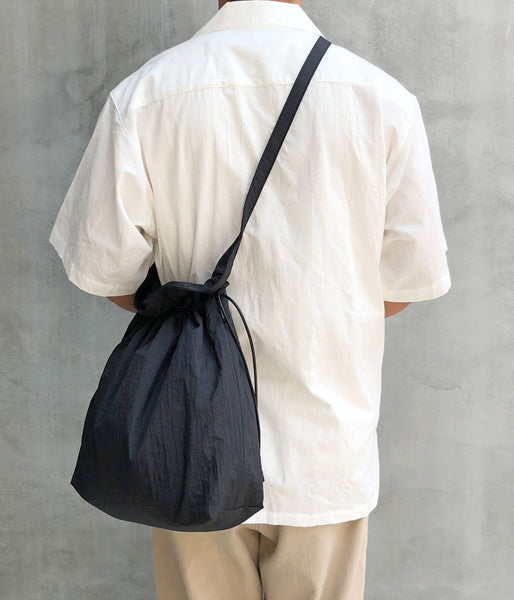 ERA./SHRINK TAFFETA BIG RED CROSS APRON BAG (BLACK)