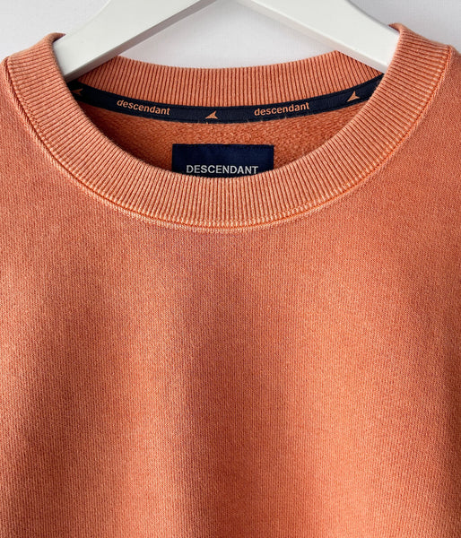 DESCENDANT/CETUS CREW NECK PIGMENT DYE (ORANGE)