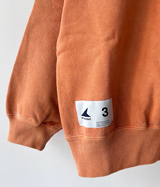 DESCENDANT/CETUS CREW NECK PIGMENT DYE (ORANGE)