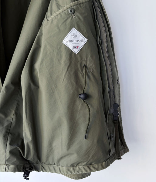 nonnative/TROOPER JACKET COTTON BACK SATIN VW WITH WINDSTOPPER® (OLIVE BLACK)