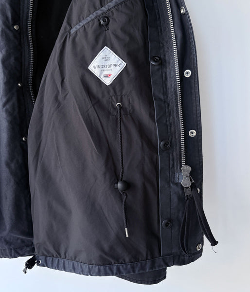 nonnative/TROOPER JACKET COTTON BACK SATIN VW WITH WINDSTOPPER® (BLACK)