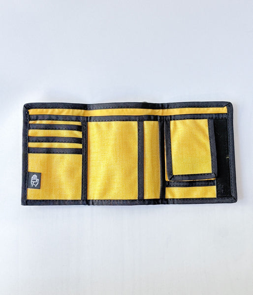 DESCENDANT/FURL WALLET TAKES HANDS	 (YELLOW)