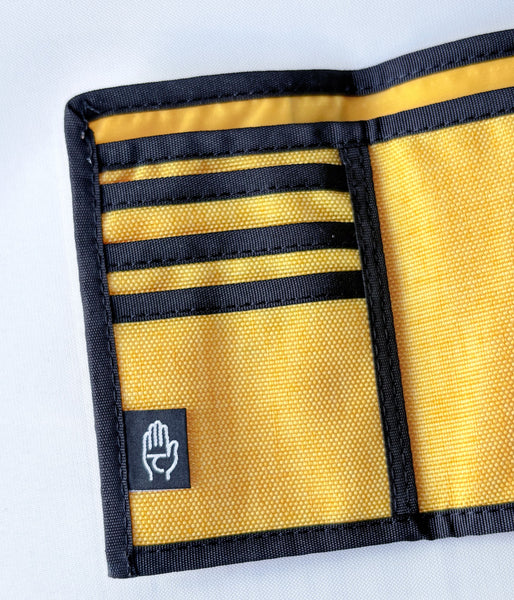 DESCENDANT/FURL WALLET TAKES HANDS	 (YELLOW)