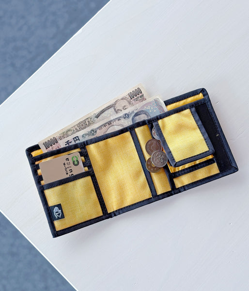 DESCENDANT/FURL WALLET TAKES HANDS	 (YELLOW)