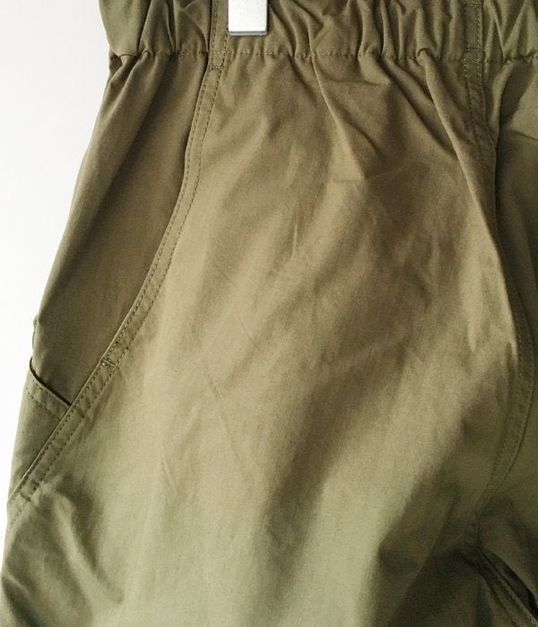 Goldwin/WIDE EASY WIND PANTS (KHAKI)