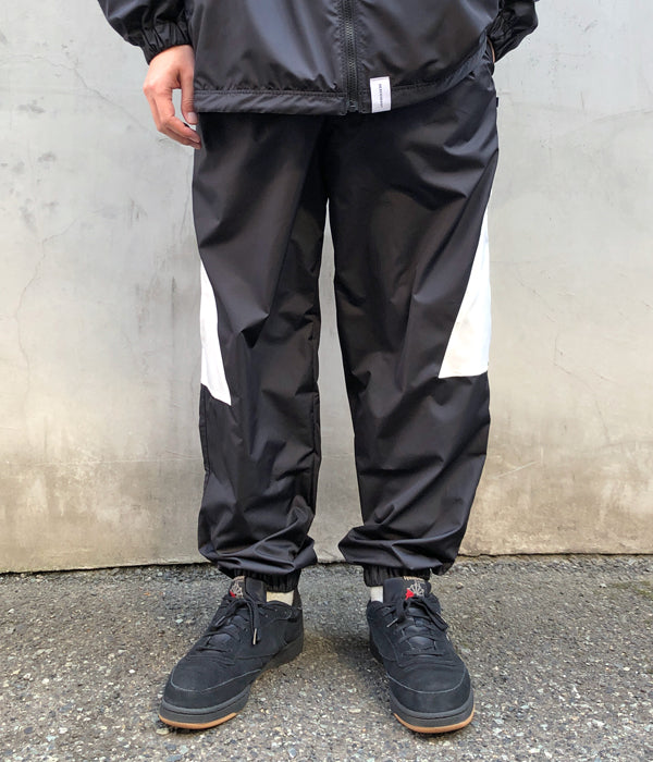 豊富な商品から DESCENDANT/UPWIND NYLON TROUSERS (BLACK) パンツ