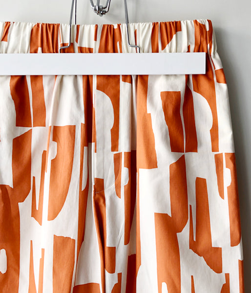 PHEENY/PRINT TYPEWRITER PAJAMAS PANTS(ORANGE)